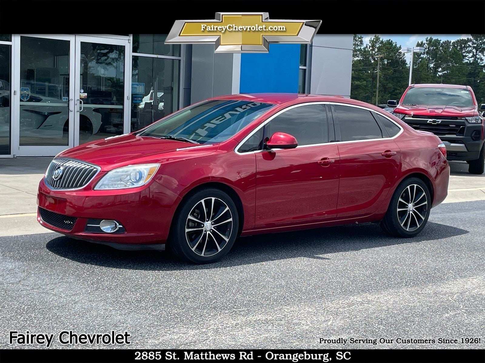2017 Buick Verano Sport Touring in Crystal Red Tintcoat — front three-quarter view