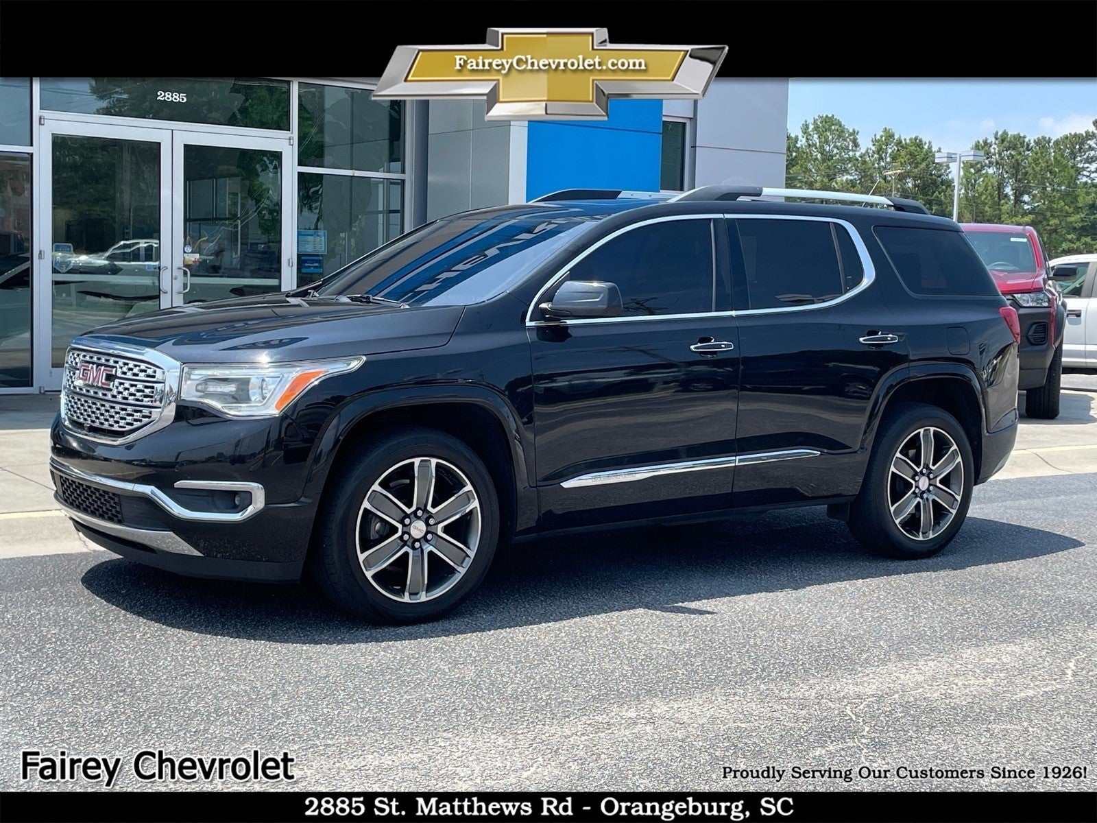 2019 GMC Acadia Denali in Ebony Twilight Metallic — front three-quarter view