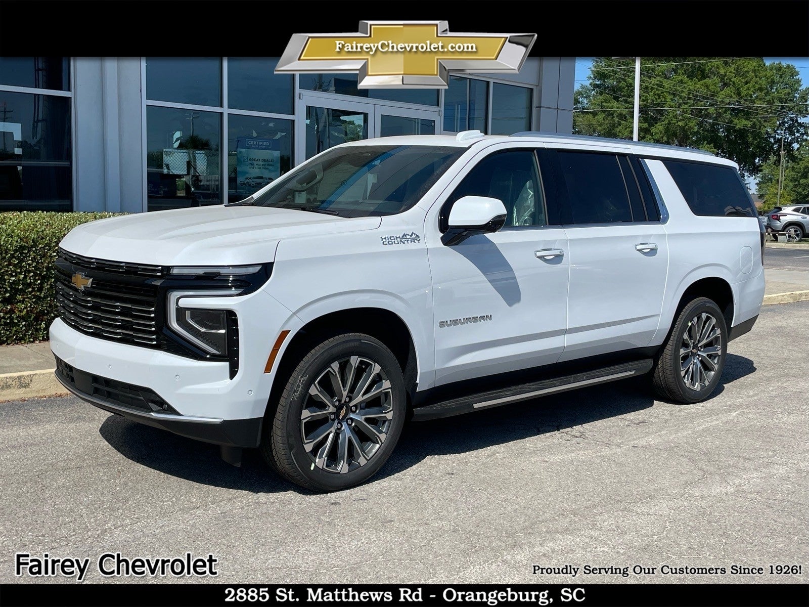 2026 Chevrolet Suburban High Country in Polar White Tricoat — front three-quarter view