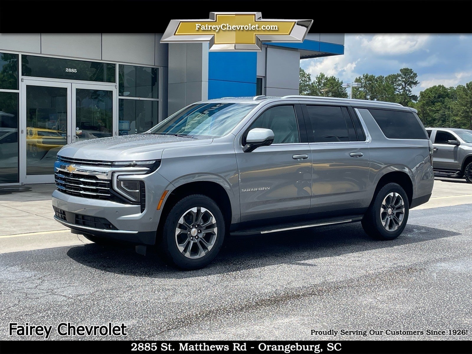 2026 Chevrolet Suburban LT in Sterling Gray Metallic — front three-quarter view