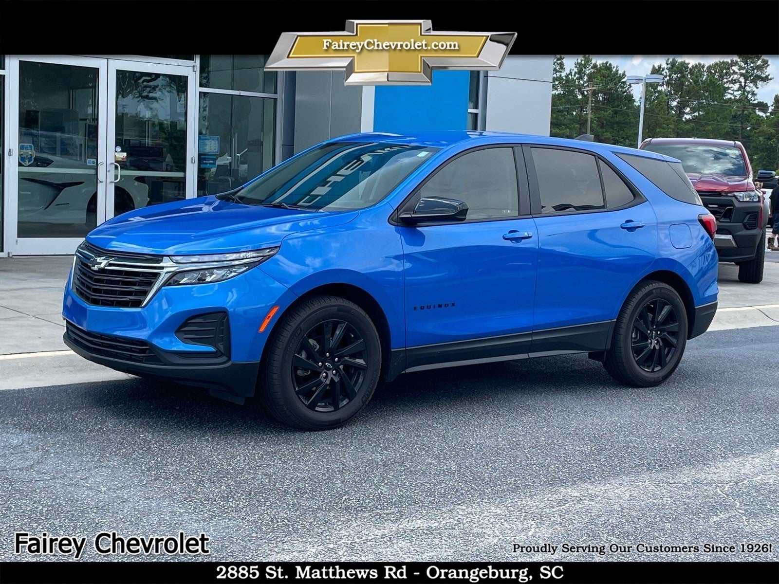 2024 Chevrolet Equinox LS in Riptide Blue Metallic — front three-quarter view
