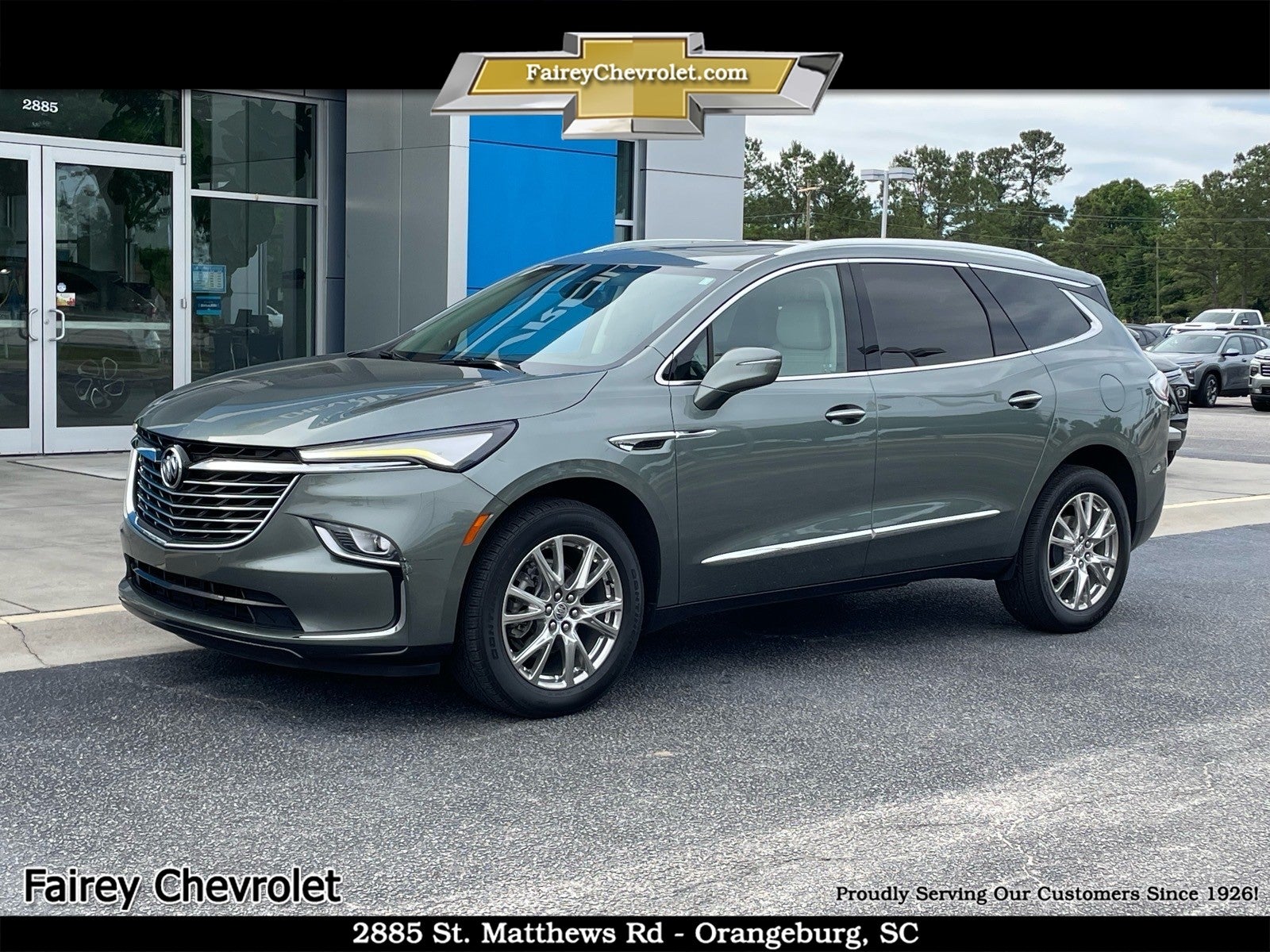2023 Buick Enclave Essence in Sage Metallic — front three-quarter view