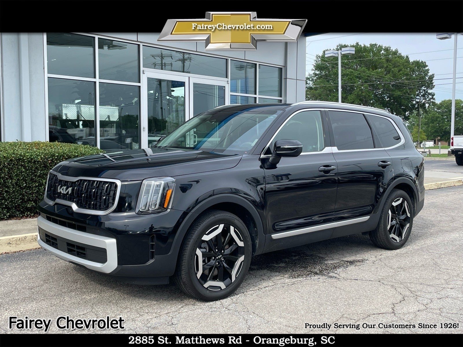 2024 Kia Telluride EX in Black — front three-quarter view